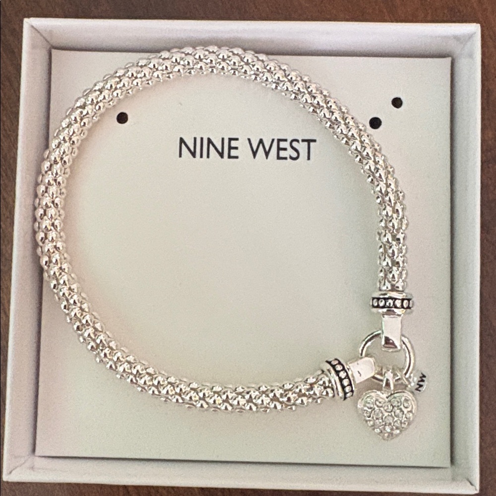 NWOT!  Nine West Textured Stretch Silver Bracelet - beautiful and so shiny!